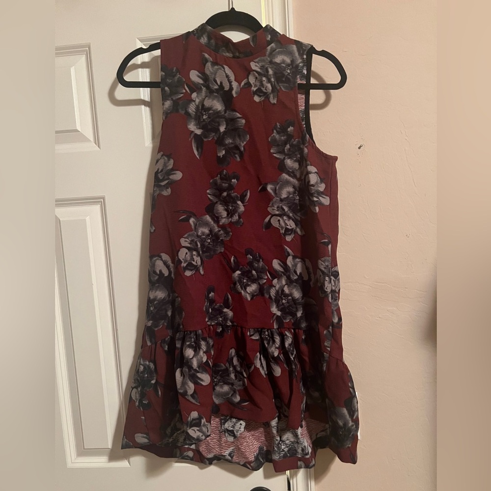 Boutique floral mini dress with bow detail on back size medium